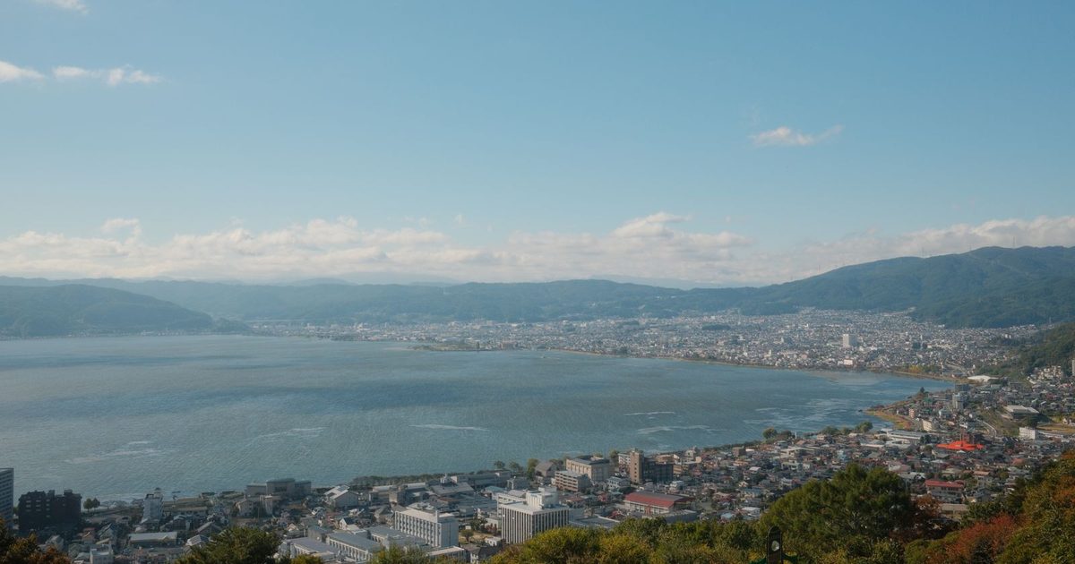 Lake Suwa and the surrounding city from above, Nagano, Japan