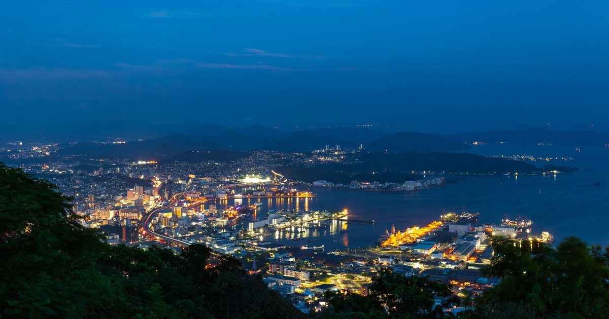 Nagasaki harbour lit up in the evening