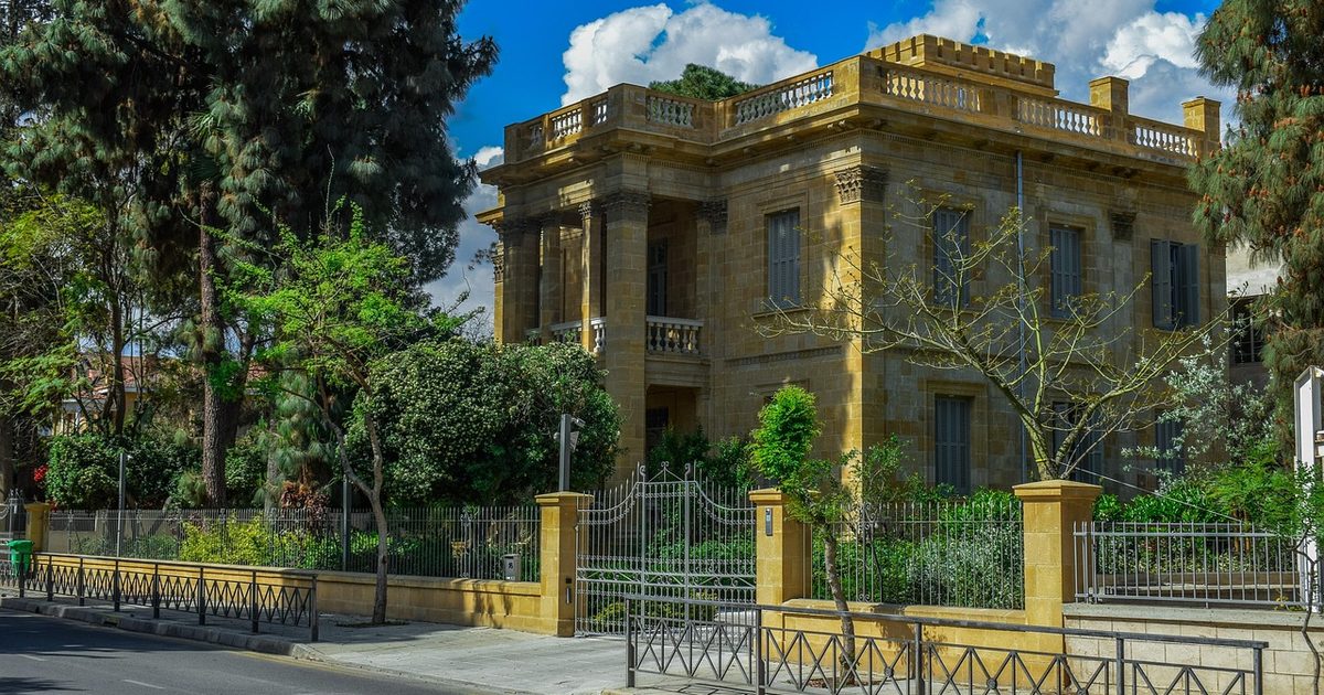 An old neoclassical house on a street in Nicosia, Cyprus
