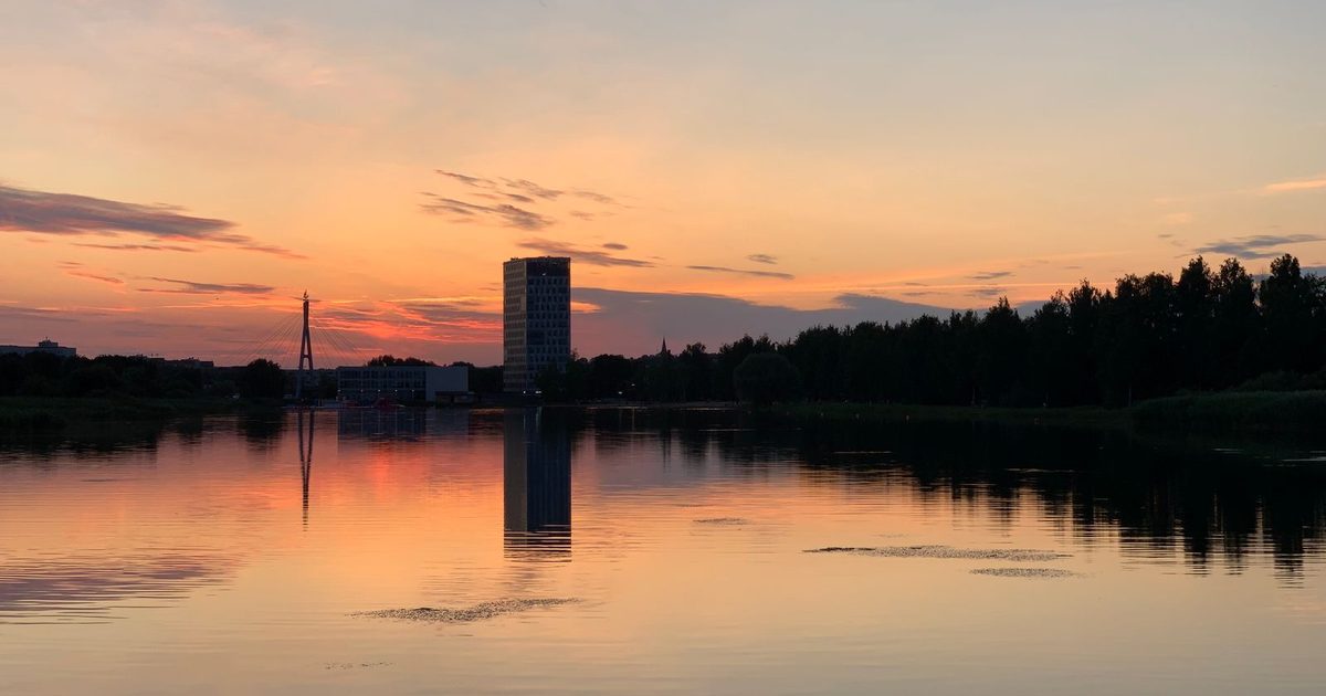 Sunset over the water and the skyline of Tartu, Estonia