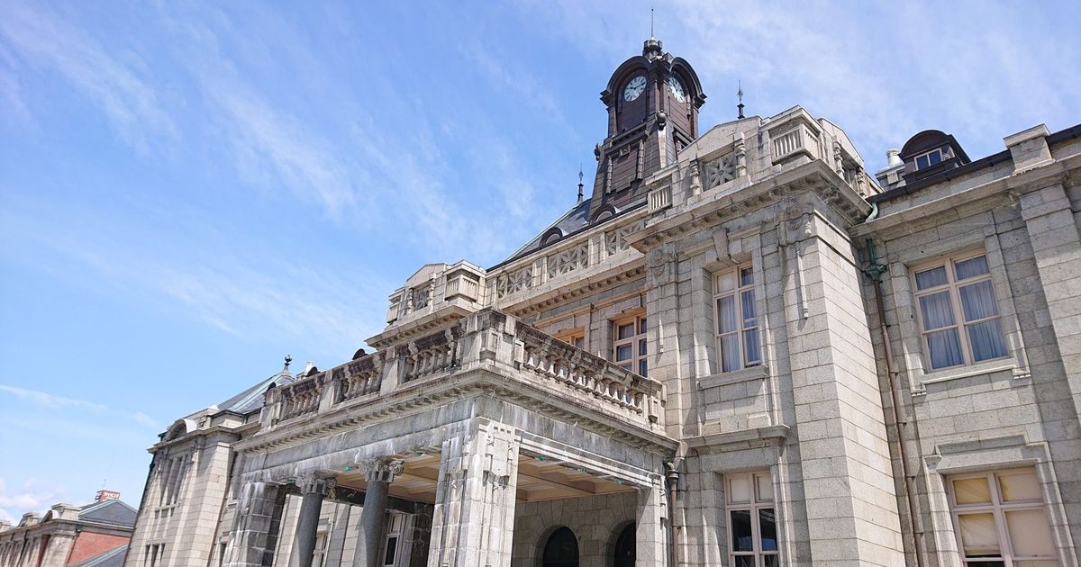 A historic stone building with a clock tower in Yamagata City, Japan